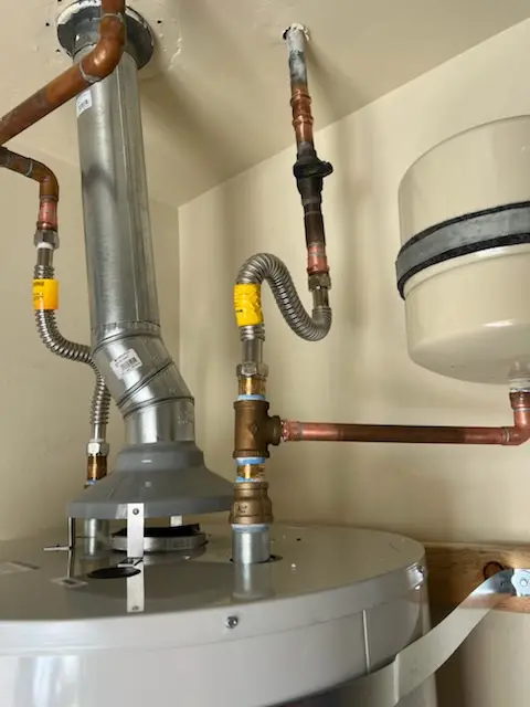 Water heater installation and plumbing repair in Heather Gardens